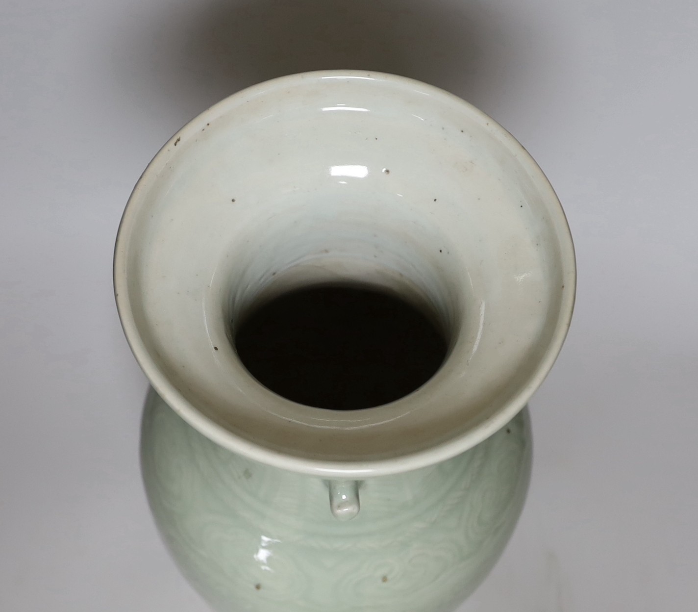 A Chinese celadon glazed vase, 19th century, 33cms high